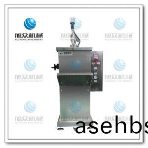 半(ban)自动(dong)立(li)式膏(gao)液灌装机(ji)