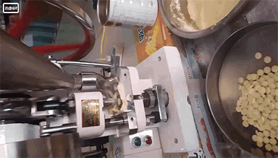 5bfe1081a7d96.gif 压片机.gif